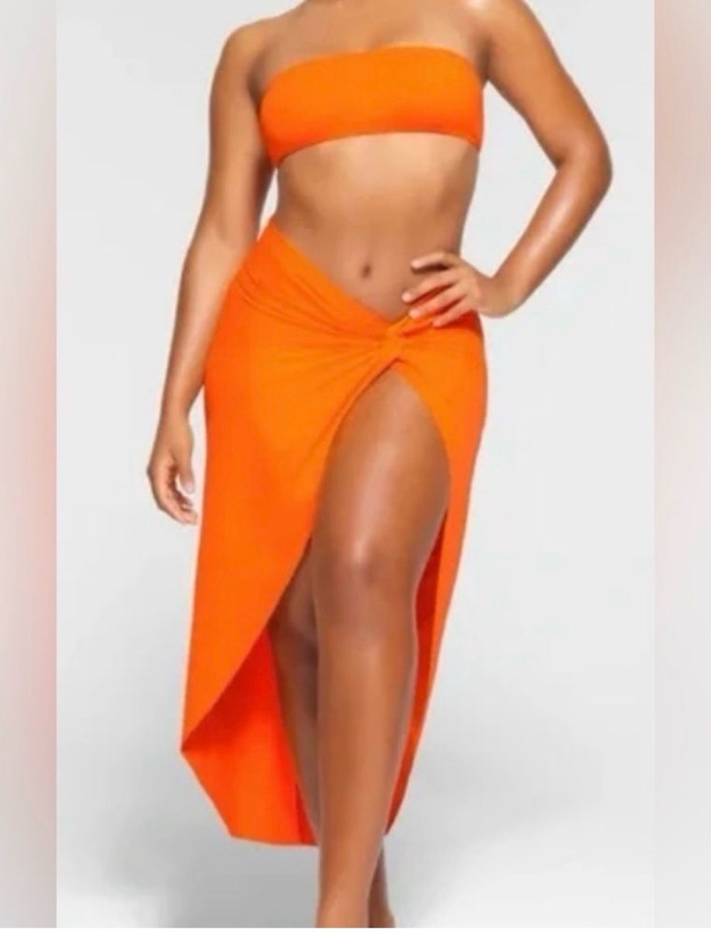 SKIMS Orange Bandeau Top and high waist bikini set with High-Slit Wrap Skirt